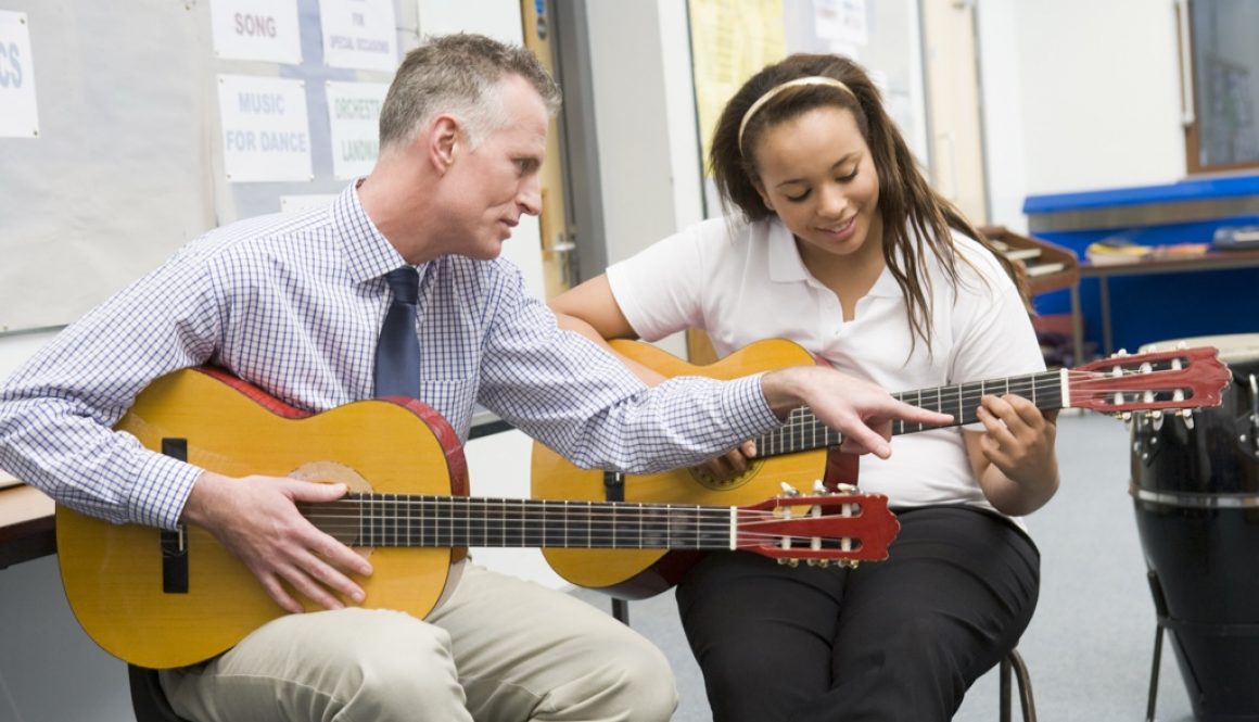 Guitar Teacher and Student